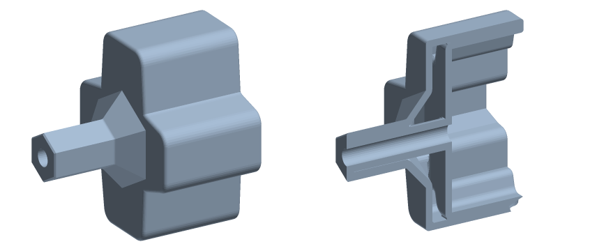 A nut crank, and the same part hollowed and cut open to show its shell.